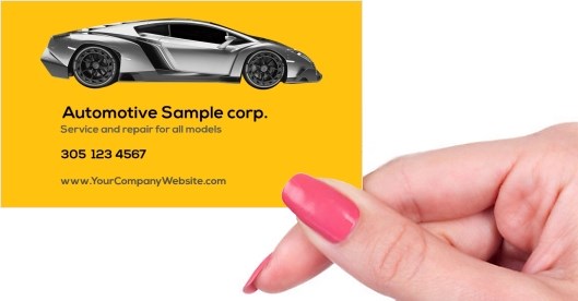 Hand holding business card -  Automotive repair business card