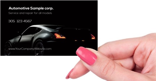 Hand holding business card -  Automotive service business card