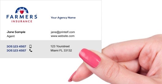 Hand holding business card -  Farmers Insurance Agent