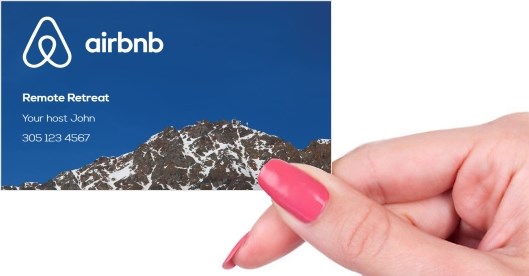 Hand holding business card -  Airbnb business card