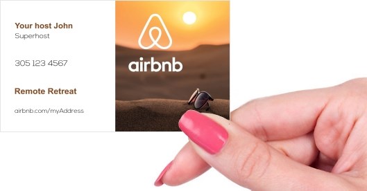 Hand holding business card -  airbnb home business card