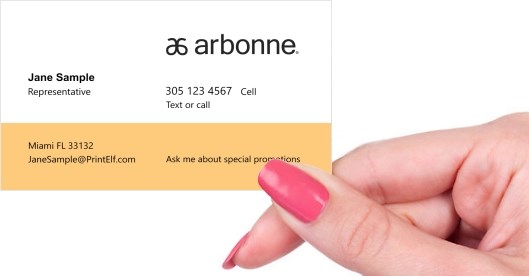 Hand holding business card -  Arbonne Member