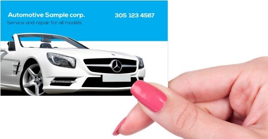 Hand holding business card -  Automotive body shop business card