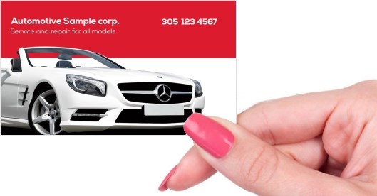 Hand holding business card -  Automotive body shop business card red