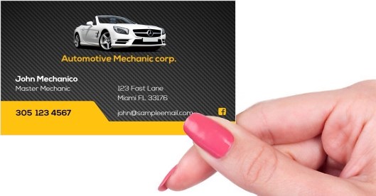 Hand holding business card -  Automotive mechanic business card