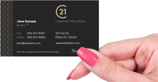 Hand holding business card -  Century 21 Commercial business card