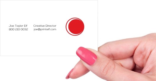 Hand holding business card -  Creative Director business card