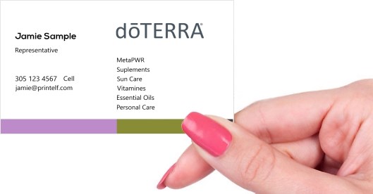 Hand holding business card -  doTERRA representative