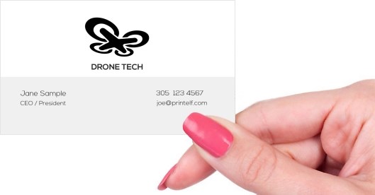 Hand holding business card -  Drone Commercial business card