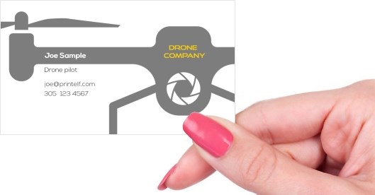 Hand holding business card -  Drone Company business card