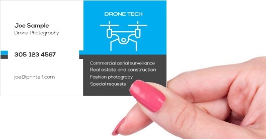 Hand holding business card -  Drone Photography