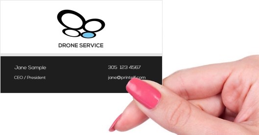 Hand holding business card -  Drone Service business card