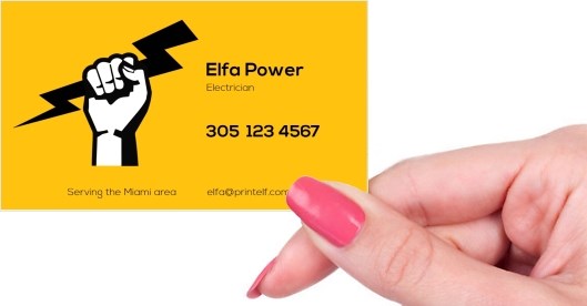 Hand holding business card -  Electrician business card