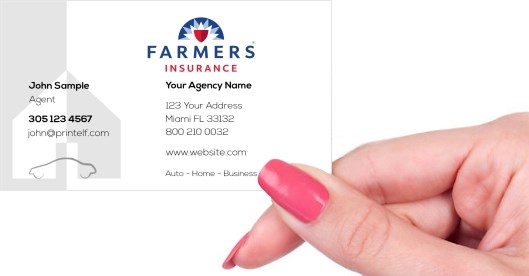 Hand holding business card -  Farmers Insurance business card