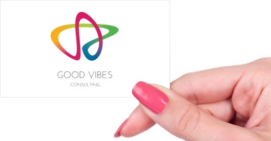 Hand holding business card -  Good Vibes business card