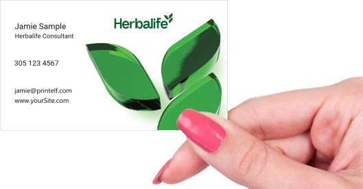 Hand holding business card -  Herbalife-Energy