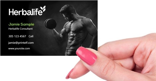 Hand holding business card -  Herbalife-Nutrition