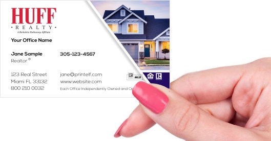 Hand holding business card -  HUFF Realty residential business card