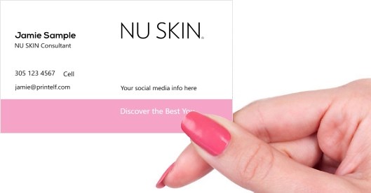 Hand holding business card -  Nu Skin Discover