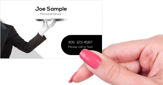 Hand holding business card -  Personal driver service