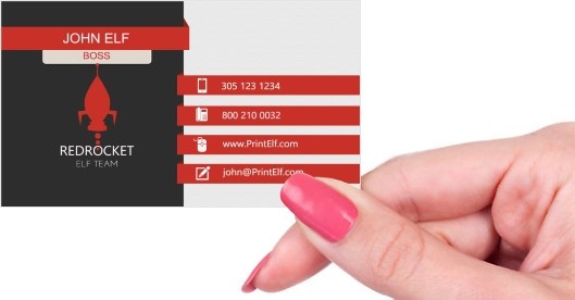 Hand holding business card -  Red Rocket business card