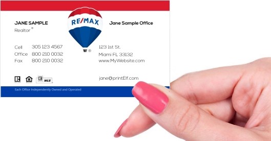 Hand holding business card -  ReMax classic balloon business card