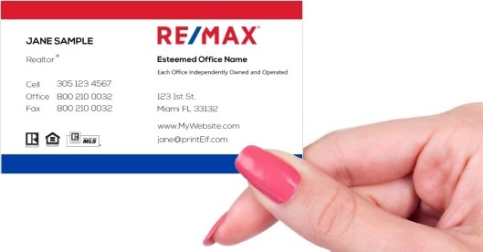 Hand holding business card -  ReMax classic business card