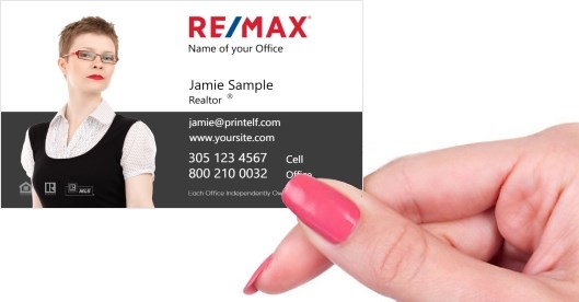 Hand holding business card -  ReMax white glove service business card