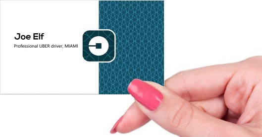 Hand holding business card -  Uber business card