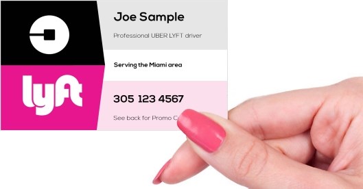 Hand holding business card -  UBER LYFT business card promo