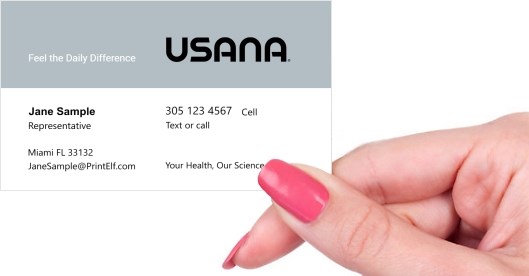 Hand holding business card -  Usana Health