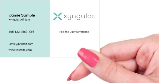 Hand holding business card -  Xyngular associate