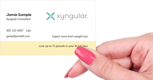 Hand holding business card -  Xyngular member