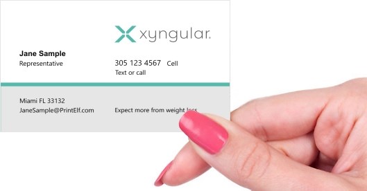 Hand holding business card -  Xyngular representative