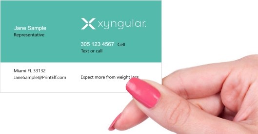 Hand holding business card -  Xyngular weight loss